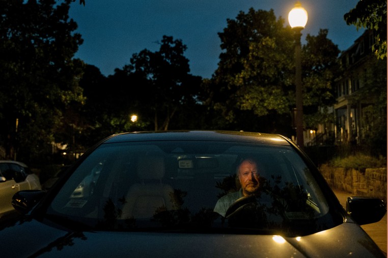 Dr. J. Michael Waller sits in his car, in Washington, D.C., on Aug. 18, 2025.