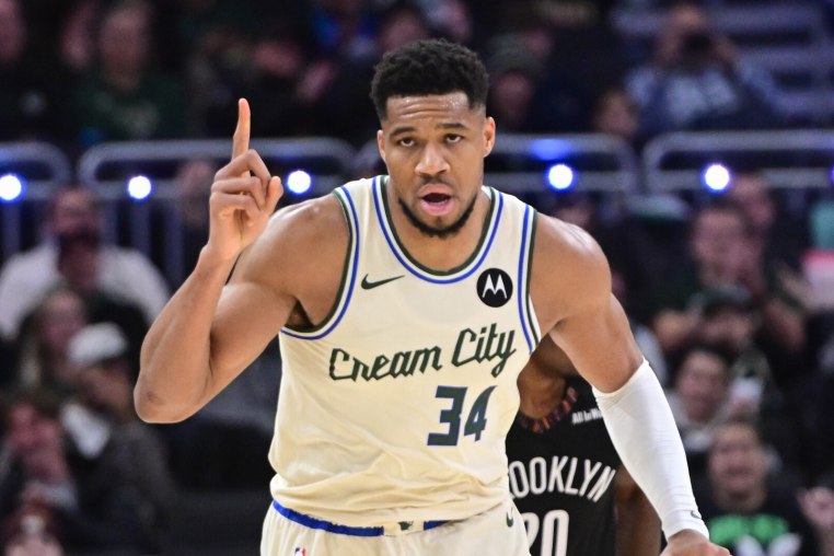 Nov 29, 2025; Milwaukee, Wisconsin, USA; Milwaukee Bucks forward Giannis Antetokounmpo (34) reacts after scoring his 21,000th career point in the third quarter against the Brooklyn Nets at Fiserv Forum. Mandatory Credit: Benny Sieu-Imagn Images