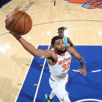 NEW YORK, NY - DECEMBER 3: Karl-Anthony Towns #32 of the New York Knicks dunks the ball during the game against the Charlotte Hornets on December 3, 2025 at Madison Square Garden in New York City, New York.  NOTE TO USER: User expressly acknowledges and agrees that, by downloading and or using this photograph, User is consenting to the terms and conditions of the Getty Images License Agreement. Mandatory Copyright Notice: Copyright 2025 NBAE  (Photo by Nathaniel S. Butler/NBAE via Getty Images)